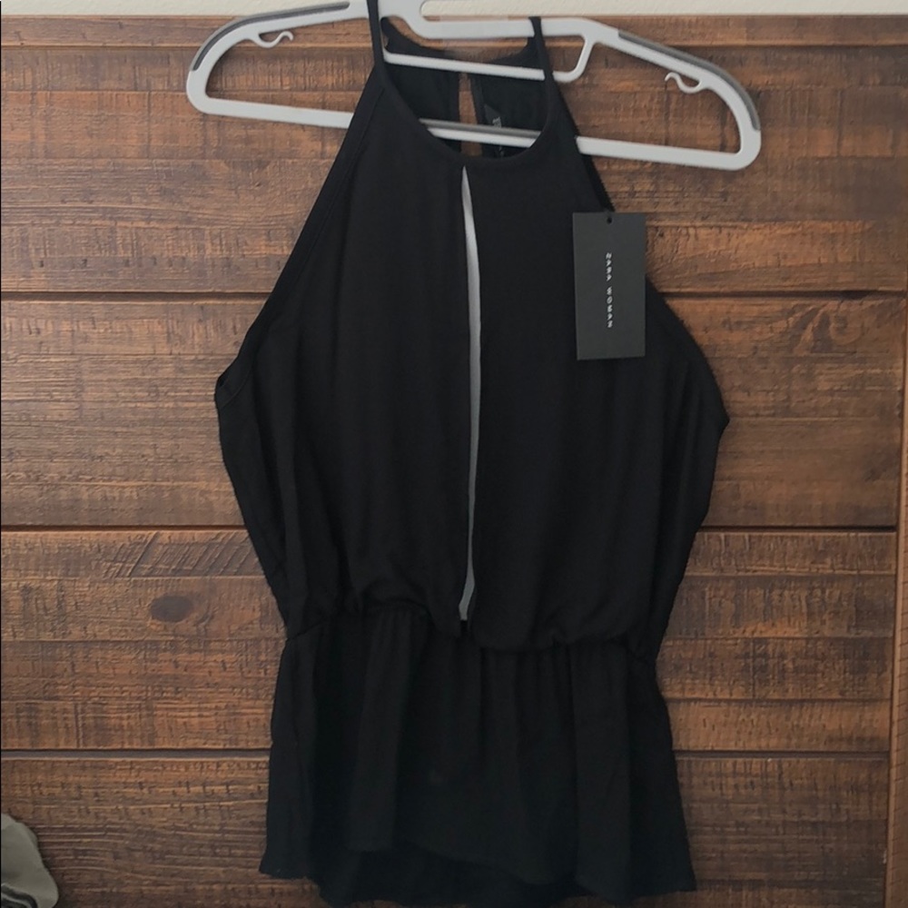 Black and White sleeveless top. New with tag.